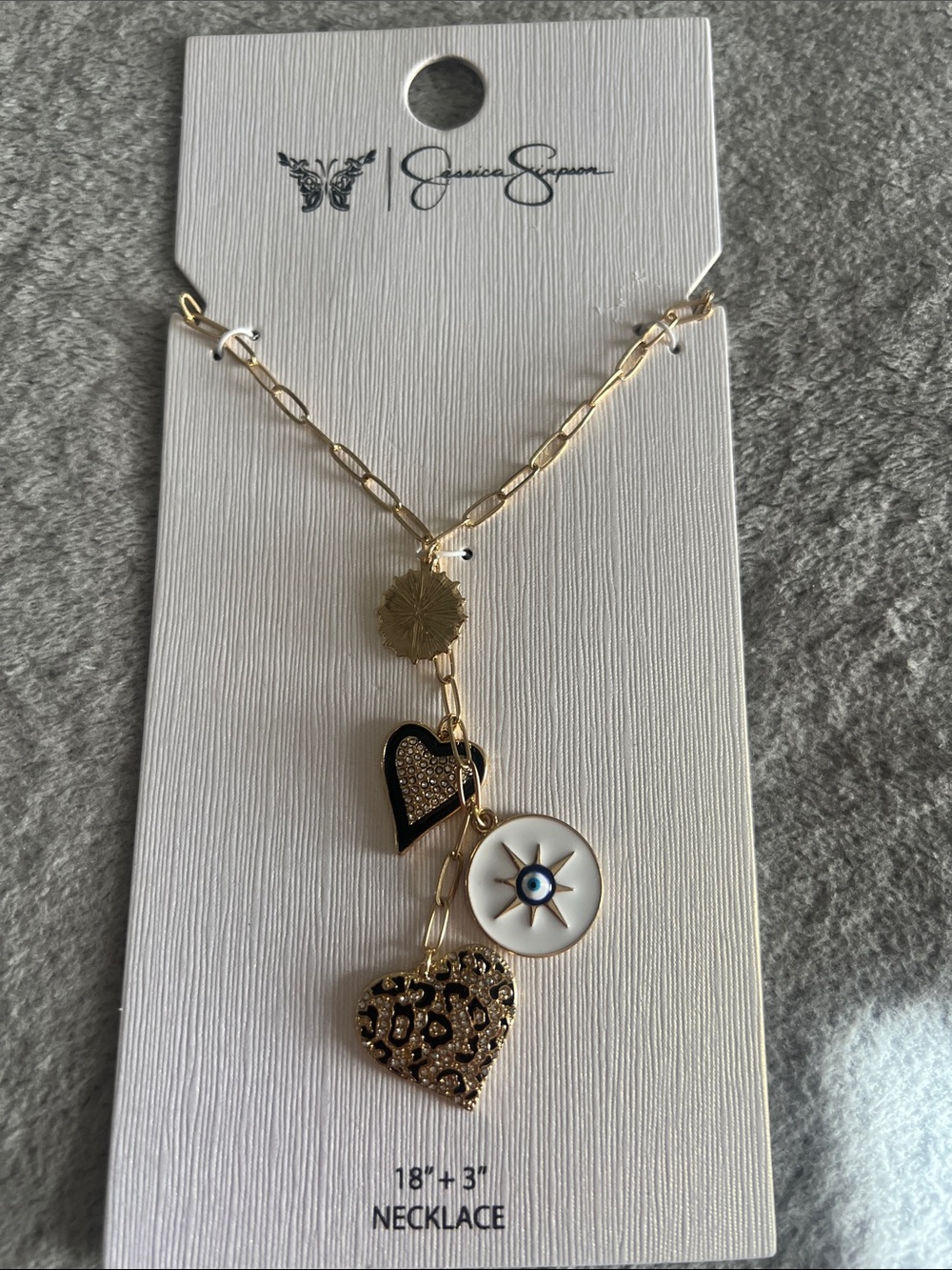 Jessica Simpson Gold Necklace with Black and White Charms